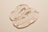hyaluronic acid gel texture macro, translucent skincare texture, clean minimal aesthetic, light beige background, soft daylight, no text
